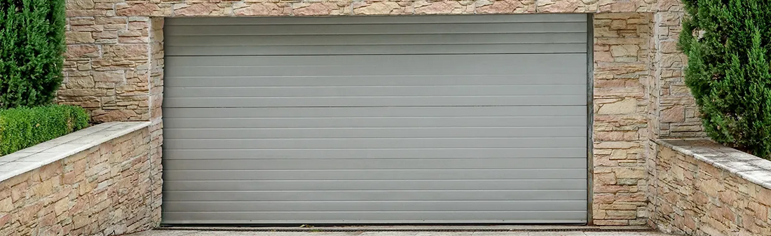Achat d'une porte de garage : Enroulable ou Sectionnelle ?