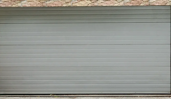 Achat d'une porte de garage : Enroulable ou Sectionnelle ?