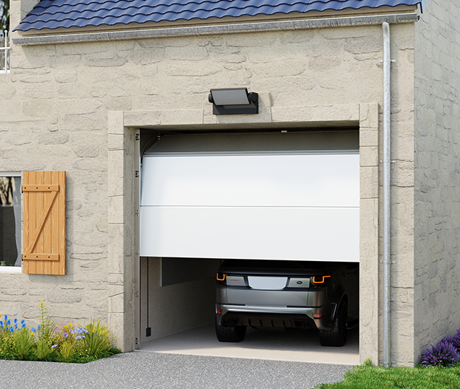 Porte de garage sectionnelle acier panneau nervuré