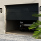 Porte de garage sectionnelle acier panneau rainuré avec hublots